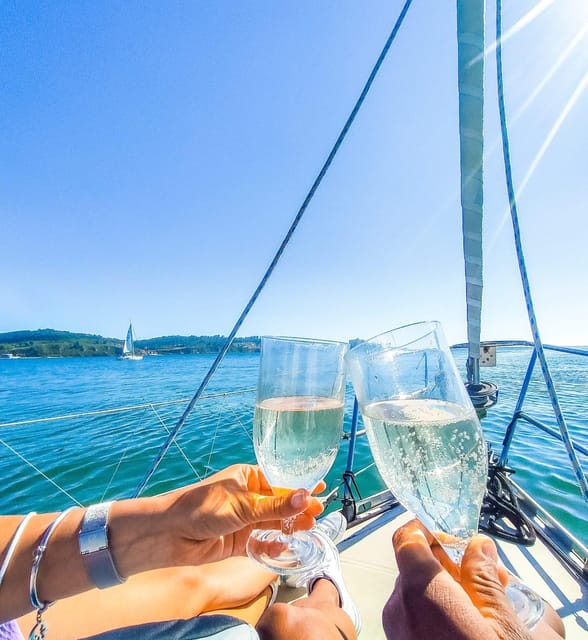 Lisbon: "Sunset" & "Day Tours" by boat, with drink and music - Key things that make this cruise worth your time