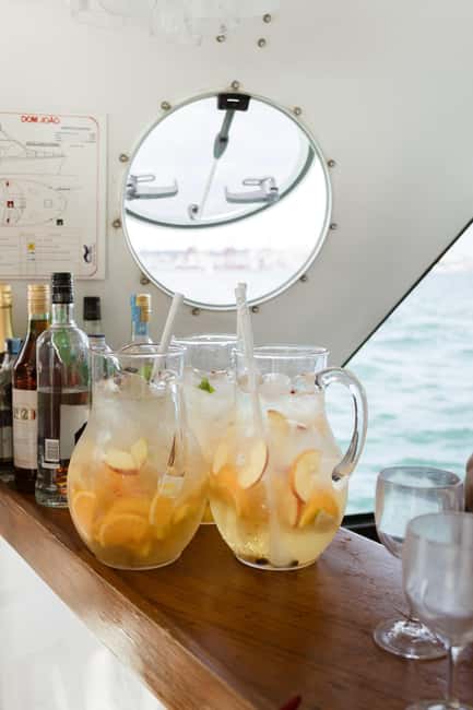 Lisbon: Sunset DJ & Porto Tonic Premium Boat Experience - Crew energy and service that keeps the night moving
