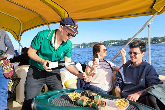 Lisbon Sunset Experience: Cruise, Wine and Live Music by the Capt - What it feels like on board: music, commentary, and a guide you remember