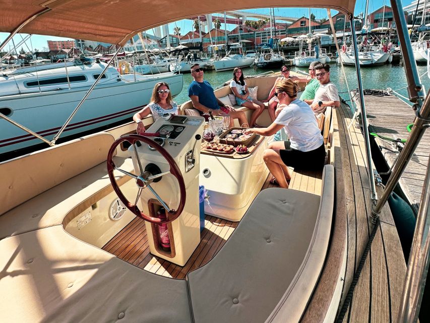Lisbon – Sunset Porto Tonic Premium Boat Experience - Guides, pacing, and what you learn (without it feeling like class)