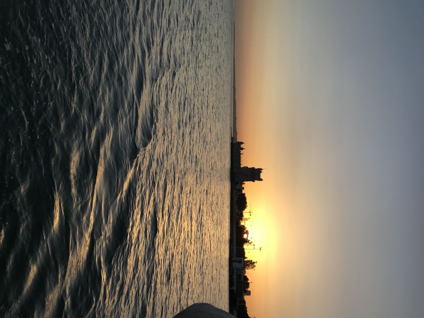 Lisbon Sunset Sailing – Small Group (max 10) Wine & History - The wine, the blankets, and why this feels calmer than a party cruise