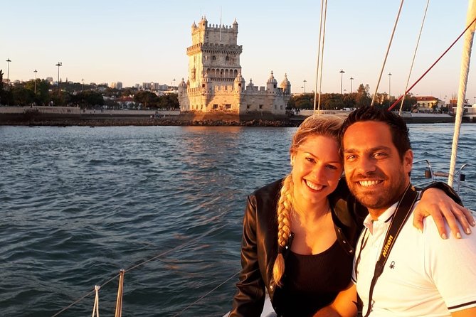 Lisbon: Sunset Sailing with Portuguese Wine and History - Your 12-meter sunset sail: comfort, blankets, and a calm pace