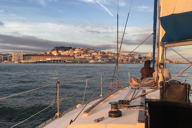 Lisbon Sunset Sensations on a Private Sailing Boat with wine&snacks - Belém’s golden hour: Torre de Belém and the Discoveries Monument