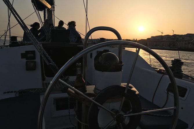 Lisbon Sunset Sensations on a Private Sailing Boat with wine&snacks - Ponte 25 de Abril and Cristo Rei: Lisbon’s story from river level
