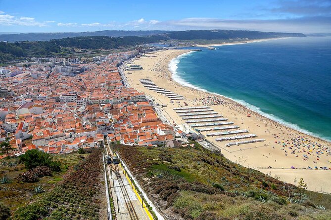 Lisbon to Porto with stop Aveiro-Fátima-Coimbra-Tomar-Nazaré-Óbidos - Aveiro: moliceiro-cruise option plus sweets and canal-town strolling