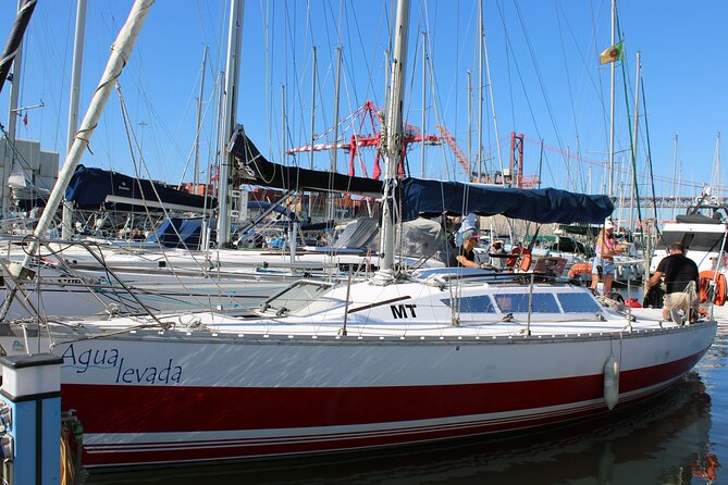 Lisbon to Vela Private Experience in the Tejo - Ponte 25 de Abril views: bridge glamour plus Alcântara and Cristo Rei angles