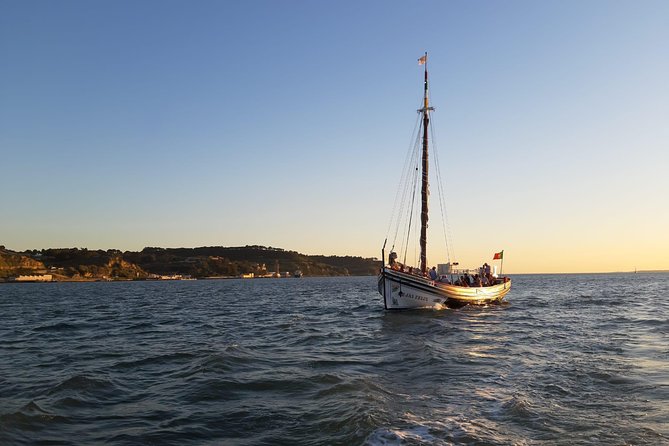 Lisbon Traditional Boats - Guided Sightseeing Cruise - Sailing out past Christo, the suspension bridge, and the Discoveries zone