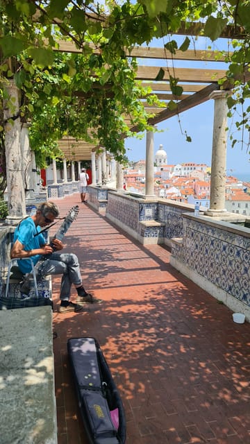 Lisbon: Tuk Tuk 1H30 Tour Old Town Complete with a Old Timer - Alfama’s Narrow Streets: Where the Tour Becomes Street-Level