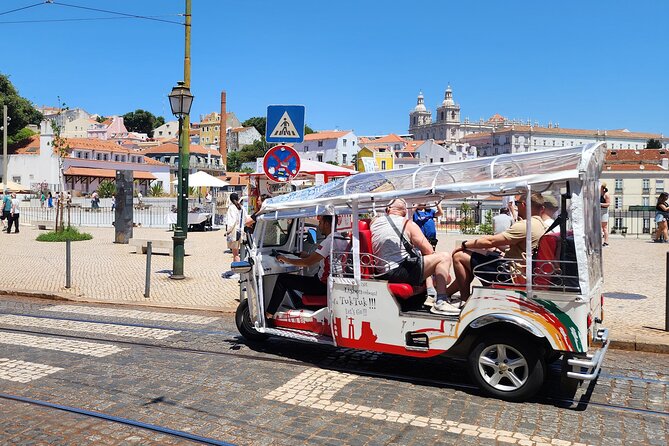 Lisbon Tuk Tuk: Explore Lisbon’s Hidden Treasures 1:30h - Portas do Sol viewpoint: postcards, coffee, and Tram 28 energy
