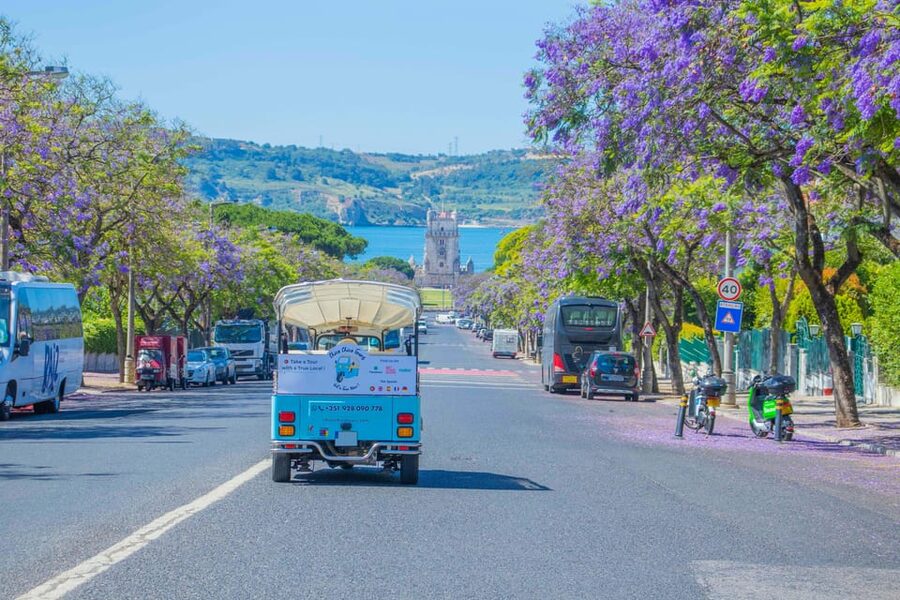 Lisbon: Tuk-Tuk Tour in French or German w/True Local Guide - Santa Justa Lift, Chiado, and Príncipe Real: the city’s stitched-together center