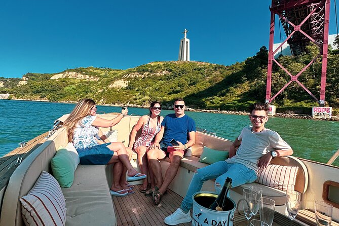 Lisbon – Vinho Verde Wine Premium Boat Experience - The sunset-and-bridge part: rolling under Lisbon’s Golden Gate twin