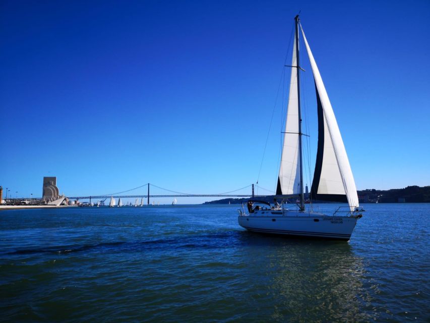 Lisbon: Yacht Sailing Tour With Portuguese Wine and History - Cristo Rei: the viewpoint stop that connects river and city height