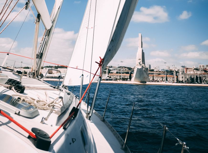Lisbon: Yacht Sailing Tour With Portuguese Wine and History - What the crew and short history talk actually do for you