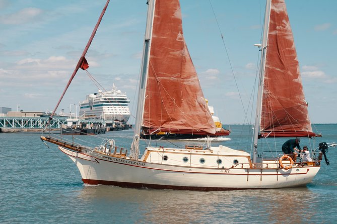 Marriage proposal on a Vintage Sailboat - From the Deck to the 25 de Abril Bridge and Padrão dos Descobrimentos