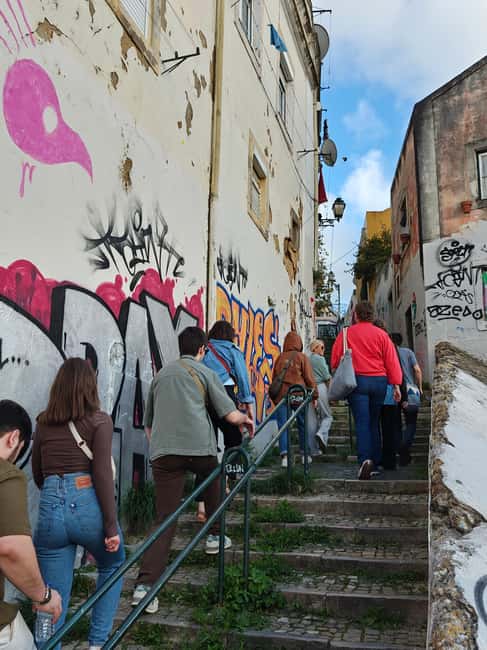 Multicultural Lisbon: Hidden Stories, Art, Food & Live Music - Mouraria’s hidden stories: immigrant life, murals, and local hangouts