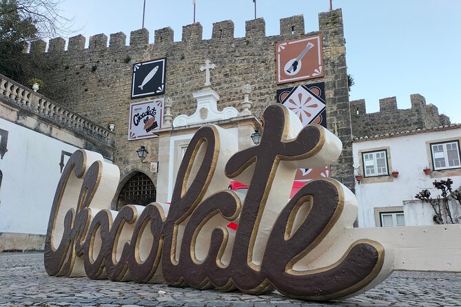 Nazaré, Óbidos and Alcobaça, Full Day Private Tour from Lisbon - Fort of São Miguel + Surf Museum: included ticket, cliff views, surf culture