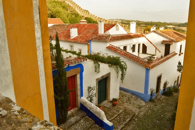 Óbidos: Medieval Tales & Secrets Spots - Ginjinha at a local’s home: an included taste you’ll actually remember