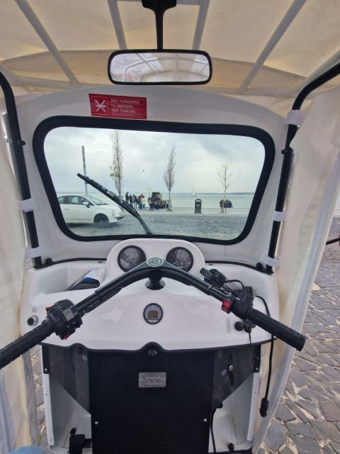 Old town of Lisbon on board of a tuk tuk- 1hour - Ginjinha tasting: the flavor moment that makes it feel Lisbon, not generic