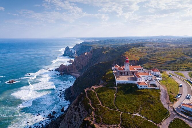 Pena Palace, Sintra, Roca Cape & Cascais on comfortable van - Sintra town center plus Quinta da Regaleira’s spiral secrets