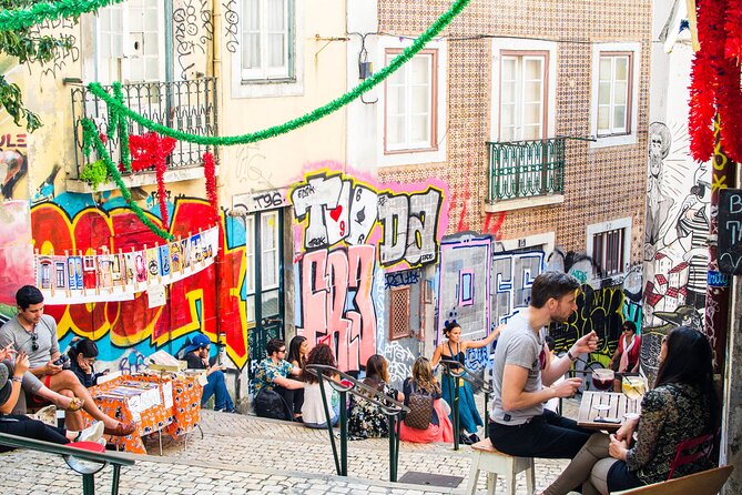 Private 4-Hour Lisbon City Highlights Tour by Tuktuk - Stops 4 and 5: Alfama’s maze streets and Praça do Comércio’s big open space