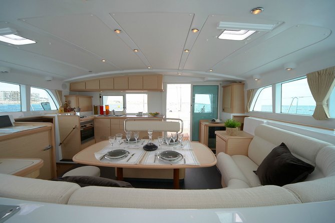 Private Catamaran Tour: Lisbon coast cruise with barbecue and drinks - Swim Stop Near Shore: Easy Open-Water Time