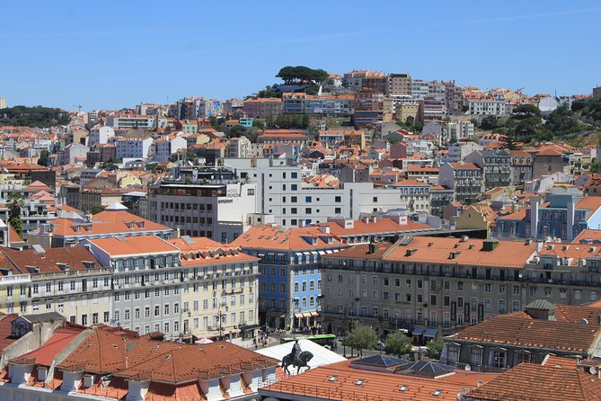 Private City Tour Lisbon Fundamental - Chiado: Fernando Pessoa, Café A Brasileira, and street-level culture