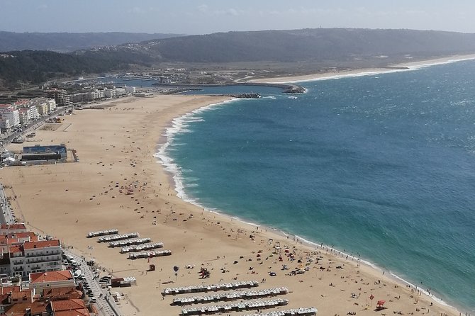 Private Experience Óbidos Nazaré and Fátima or Aveiro and Óbidos - Farol de Nazaré Cliffs: When Weather Gives You the Best Show