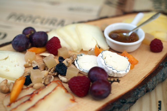 Private Lisbon Walking Tour with Premium Port Wine and Tapas Tasting - The big finish at the wine bar: 5 ports, cheese, meats, and olive oil