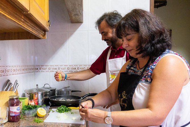 Private Portuguese Cooking Class in Lisbon with Paulo and Family - Meeting Paulo and Susana: the welcome, wine, and family rhythm