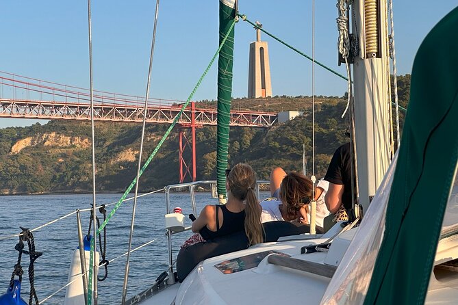 Private Sunset Sailing Boat Tour in Lisbon - 25 de Abril Bridge from the deck: a suspension-bridge with real scale