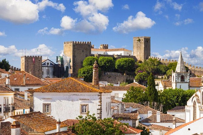 Private Tour Fátima, Nazaré, and Óbidos Day Trip from Lisbon - Stop 4: Óbidos walls, tiles, and a ginja tasting