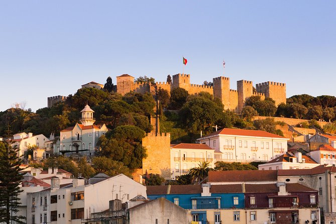 Private Tour: Lisbon Sunset Walking Tour with Fado Show and Dinner - Ginjinha and a calm bar moment before the big viewpoints