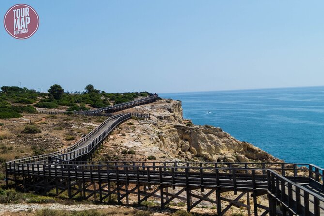 Private Tour Lisbon to Algarve: Benagil Cave, Lagos, & Carvoeiro - Praia Dona Ana and Marinha Beach: cliffs, water, and quick adventure time