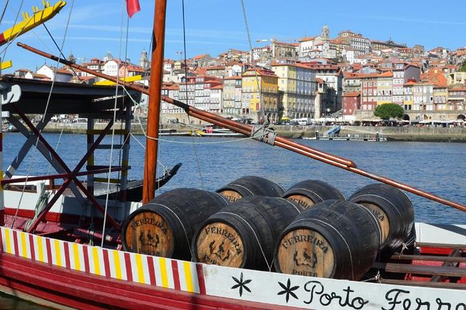 Private Tour to History of Porto & Porto Calem Cellars & Wine Tasting - Cais da Ribeira and Praça da Ribeira: views, stairs, and that cube fountain