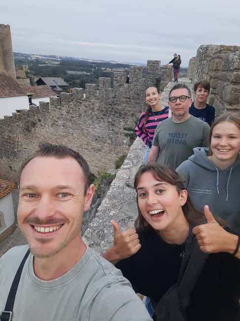 Private tour to Nazaré, Alcobaça, and Obidos from Lisbon - Óbidos: medieval streets, guided context, and ginja tasting