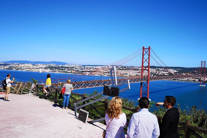 Private Trip to Arrábida Natural Park, Palmela Castle and Setúbal - Getting out of Lisbon: pickup, bridge crossing, and Cristo Rei