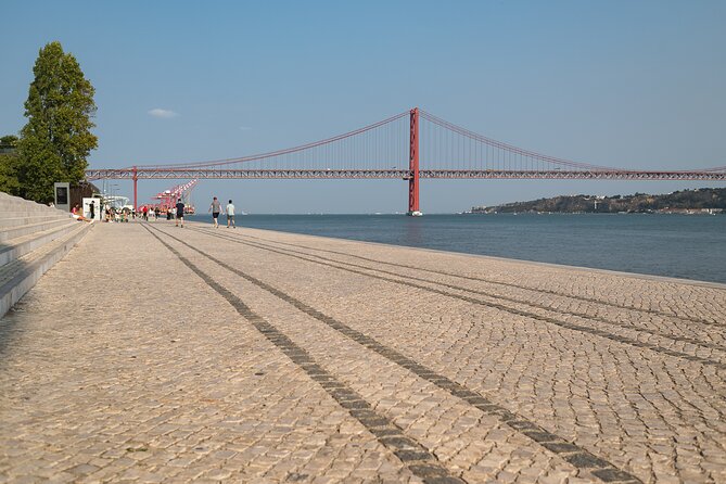 Private Walking Food Tour in Lisbon - Belém - Belém gardens, Praça do Império, and the UNESCO workhorse