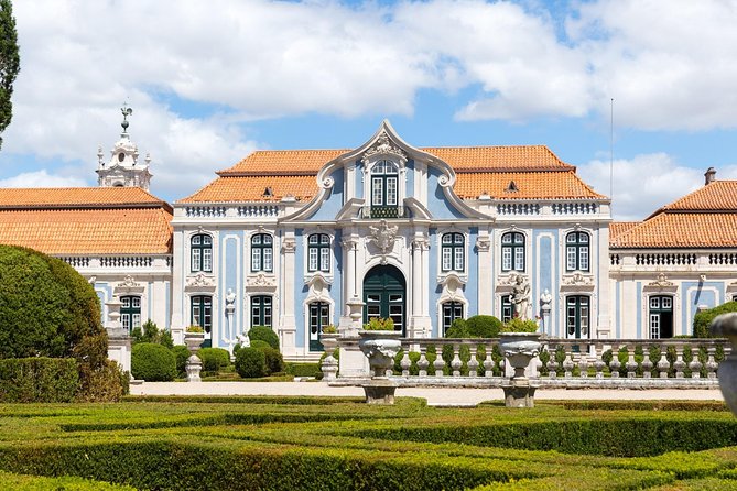 Queluz Royal Palace, Mafra Royal Palace and Convent Private Tour from Lisbon - Entering Mafra National Palace: Baroque Power at 1,200 Rooms