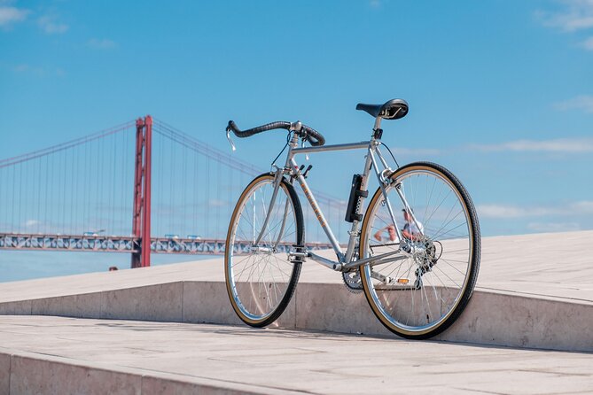 Riverside Ride Audio Adventure Lisbon to Belem - The Tejo Explorers Monument: Limestone, Legends, and a Clear Photo Line