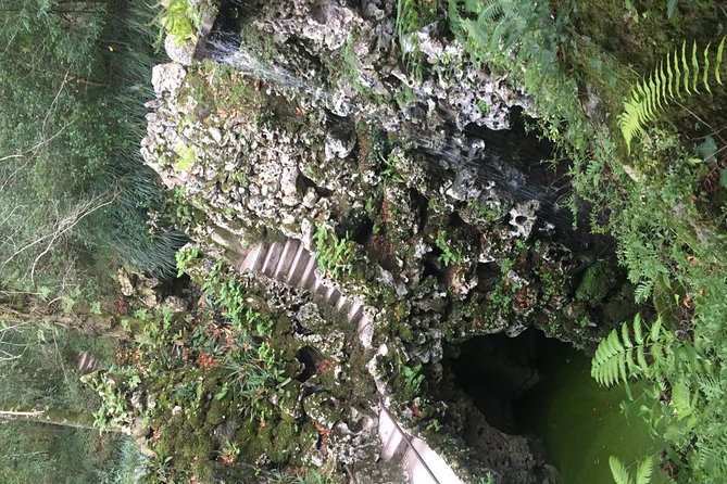 Sintra and Cascais with a Local Guide - Group tour starting from Sintra - Quinta da Regaleira: caves and tower symbolism in less than an hour