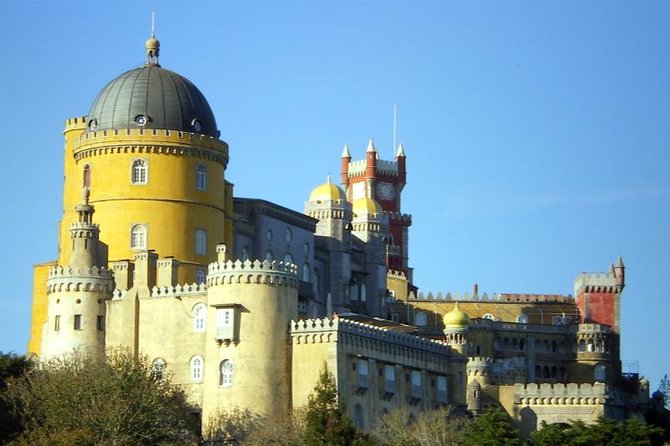 Sintra & Cascais Day Tour with Pena Palace Entry and Gardens Walk - Sintra village free time: lunch, pastries, and postcard streets