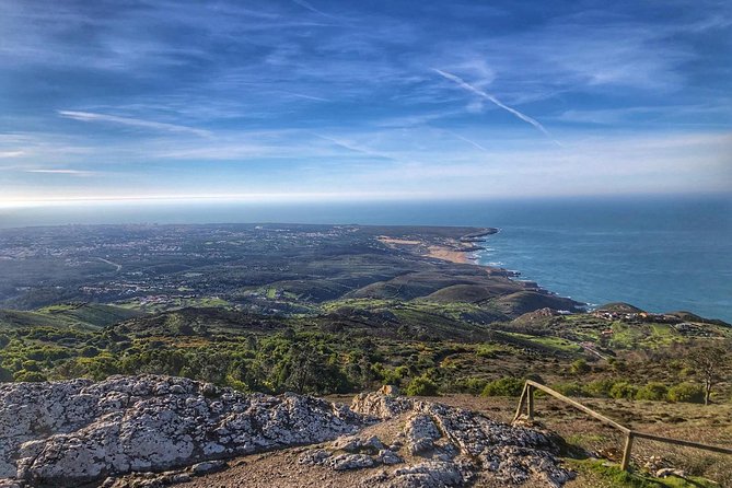 Sintra Cascais (Wine and Tapas) 4X4 Land Rover Panoramic Private Tour - Guincho and the Hell’s Mouth cave: surf energy plus a dramatic seaside photo