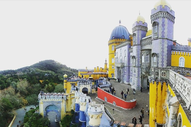 Sintra Full-Day Private Tour - A Journey through Wonderland - Quinta da Regaleira: Caves, Secret Wells, and Symbolic Gardens