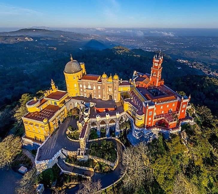 Sintra: Pena Palace and Park Entry Ticket with Tuk Tuk Ride - From the bank to the palace gate: how the tuk-tuk ride really works