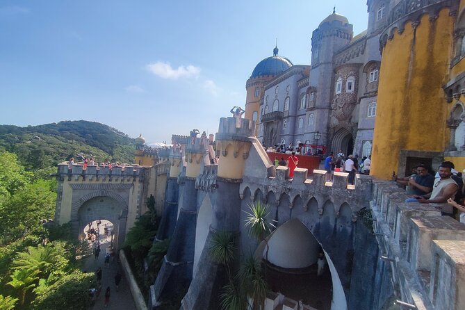 Sintra, Pena, Regaleira , and Cascais Guided Day Tour from Lisbon - Pena Palace and Gardens: Crowds, Uphill Walking, and How the Guide Changes Everything