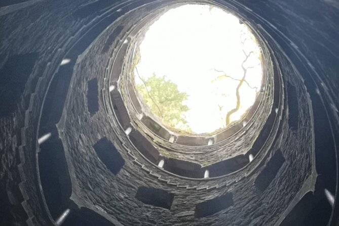 Sintra Tour with Pena Palace, Moorish Castle and Regaleira - Private - Stop 4: Quinta da Regaleira, wells, and hidden cave-feelings
