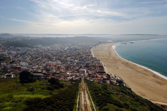 Small Group Tour to Fátima, Batalha, Nazaré and Óbidos from Lisbon - Óbidos: UNESCO Walls, Castle Energy, and Ginja de Óbidos
