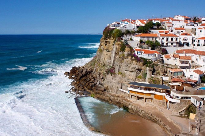 Small Group Tour to Pena Palace , Sintra , Regaleira and Cascais - Stop 1: Pena Palace, the Portugal postcard moment