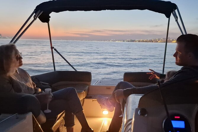 Sunset and Night Cruise with Champagne - The 2-hour itinerary: Lisbon landmarks and Almada views in photo-sized moments