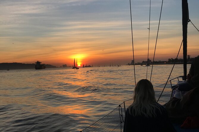 Sunset sailboat tour in Lisbon with green wine - Belém Tower area views from the water (and why they look better at sunset)